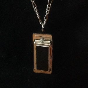 Mini harmonica necklace.